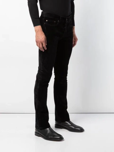 Shop Saint Laurent Slim Bootcut Jeans - Black
