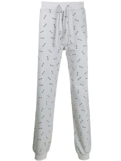 Shop Moschino Jogginghose Mit Logo-print - Grau In Grey