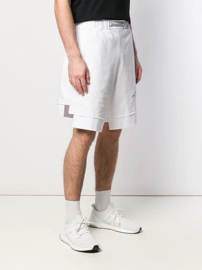 Shop Ih Nom Uh Nit Logo Layered Shorts In White