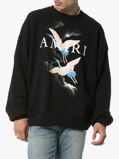 Shop Amiri Graphic Print Oversized Sweatshirt - Black