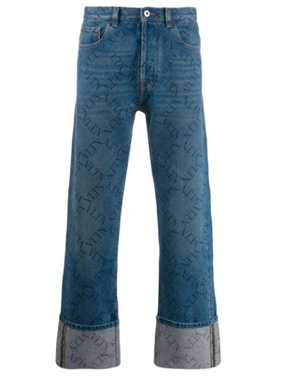 Shop Valentino Rolled-up Hems Vltn Jeans In Blue