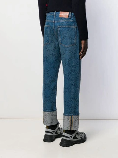 Shop Valentino Rolled-up Hems Vltn Jeans In Blue