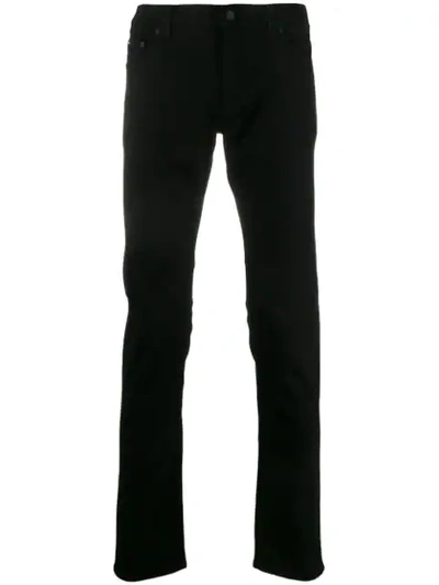 Shop Dolce & Gabbana Logo Plaque Skinny Jeans In Black