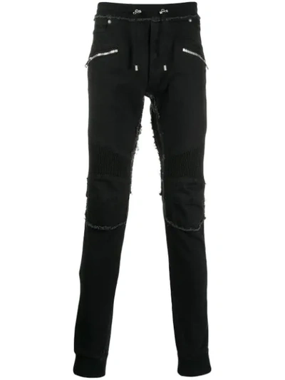 Shop Balmain Frayed Skinny Trousers In Black