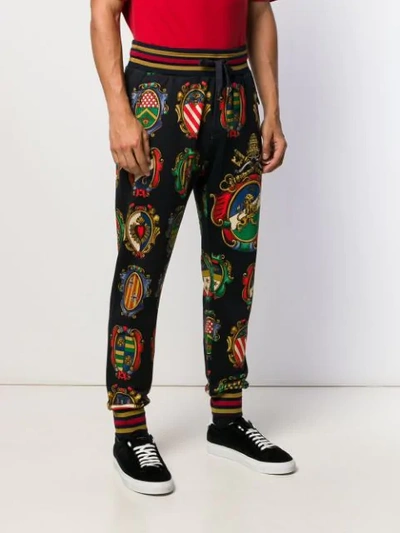 Shop Dolce & Gabbana Plaque Track Pants In Black