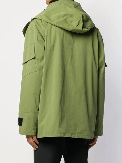 Shop Yves Salomon Hooded Rain Jacket In Green