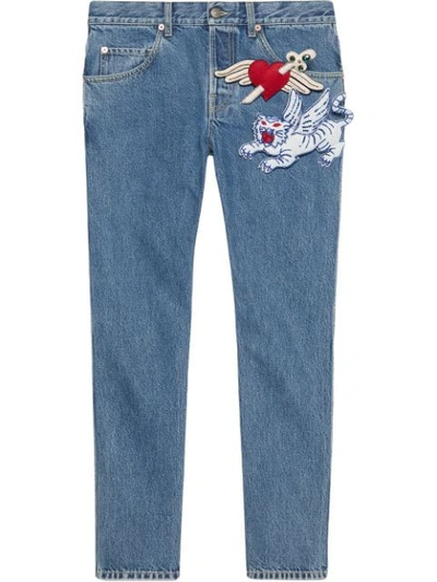 Shop Gucci Tapered Denim Trousers In Blue