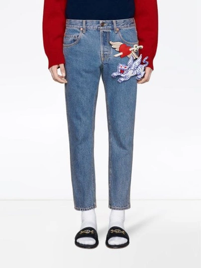 Shop Gucci Tapered Denim Trousers In Blue
