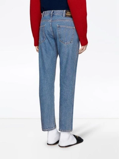 Shop Gucci Tapered Denim Trousers In Blue