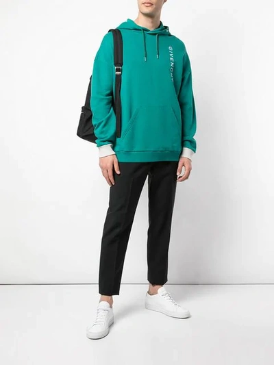 Shop Givenchy Vertical Logo Hoodie In Green
