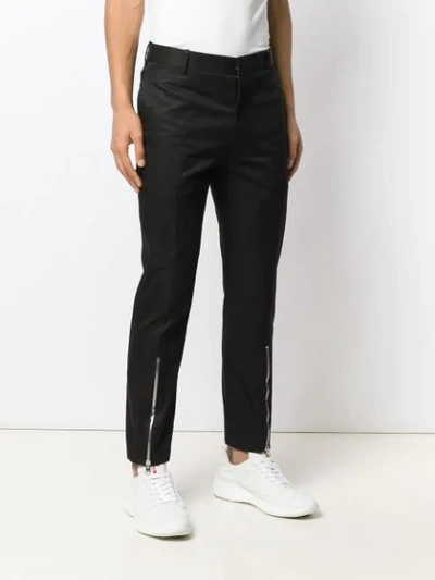 Shop Alexander Mcqueen Zip Front Trousers In Black