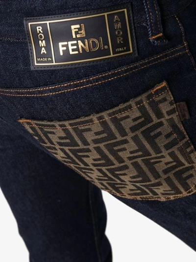 Shop Fendi Schmale Jeans Mit Logo-tasche In Blue