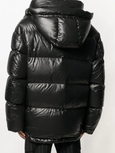 Shop Juunj Oversized Padded Jacket In Black