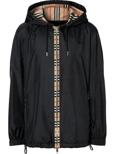 Shop Burberry Icon Stripe Detail Nylon Canvas Hooded Jacket In Black