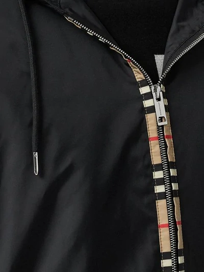 Shop Burberry Icon Stripe Detail Nylon Canvas Hooded Jacket In Black