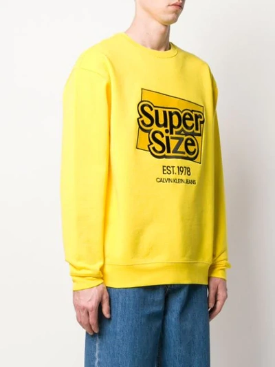 Shop Calvin Klein Jeans Est.1978 Slogan Logo Sweatshirt In Yellow