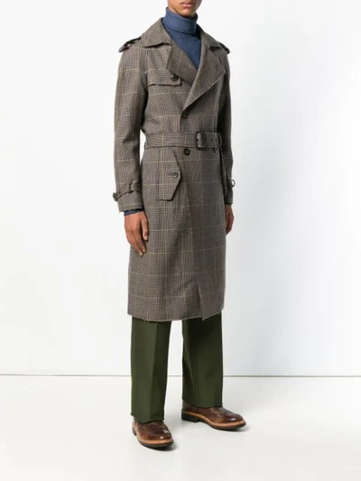 checked trench coat