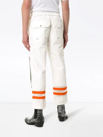 Shop Calvin Klein 205w39nyc Striped Hem Trousers In White