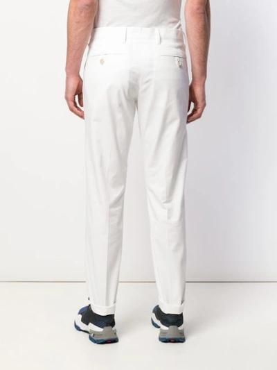 Shop Prada Slim-fit Chinos In White