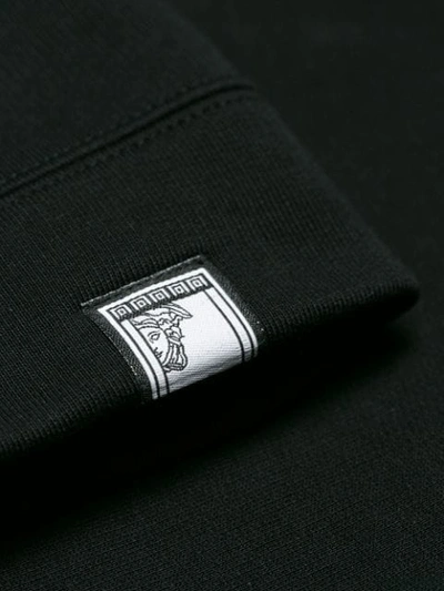 Shop Versace Spike Detail Sweatshirt In Black