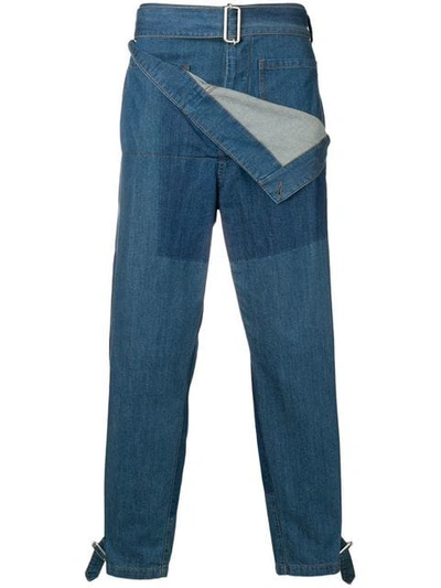 Shop Jw Anderson Belted Denim Trousers In Blue