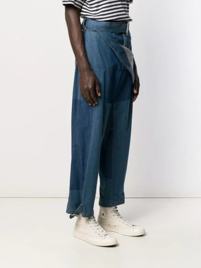 Shop Jw Anderson Belted Denim Trousers In Blue