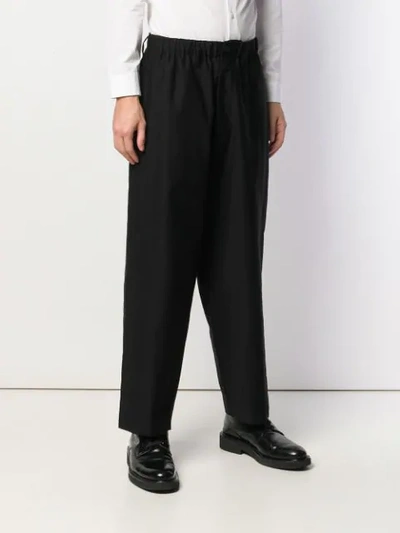 Shop Yohji Yamamoto Wide Leg Trousers In Black