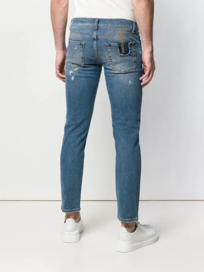 Shop Dolce & Gabbana Slim Distressed Jeans In Blue