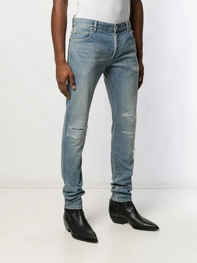 Shop Balmain Distressed Skinny Jeans In Blue