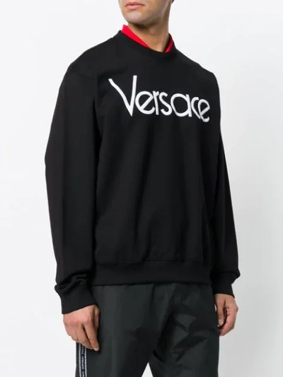 Shop Versace Logo Print Sweatshirt In A99c Nero Bianco