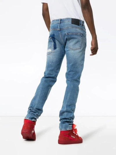 Shop Heron Preston Slim-fit Logo Pocket Jeans In Blue
