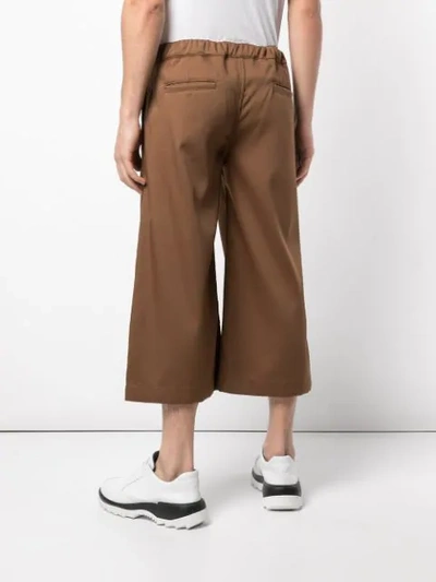 Shop Telfar Stripe Trousers In Brown