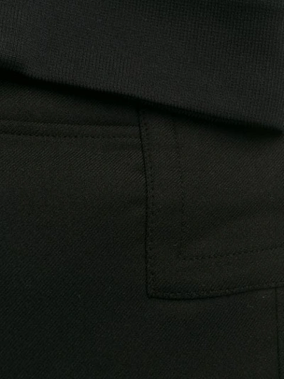 Shop Alexander Mcqueen Zipped Hem Straight-leg Trousers In Black
