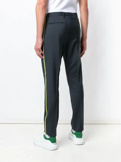 Shop Valentino Side Stripe Skinny Trousers In Grey