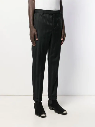 Shop Saint Laurent Striped Tailored Trousers In Black
