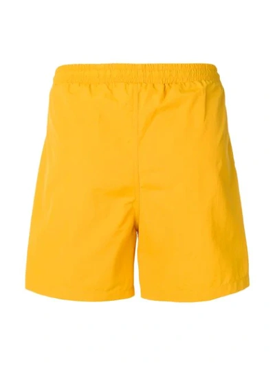 Shop Mcq By Alexander Mcqueen Mcq Alexander Mcqueen Swallow Patch Swim Shorts - Yellow