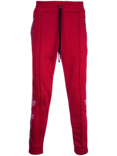 Shop Amiri Souvenir Track Pants In Red