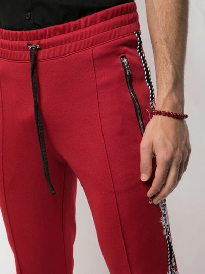 Shop Amiri Souvenir Track Pants In Red