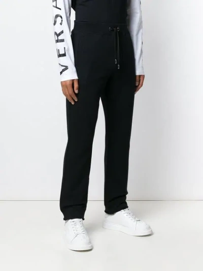 Shop Versace Medusa Logo Patch Track Trousers In Black