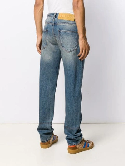 Shop Loewe Faded Effect Jeans In Blue