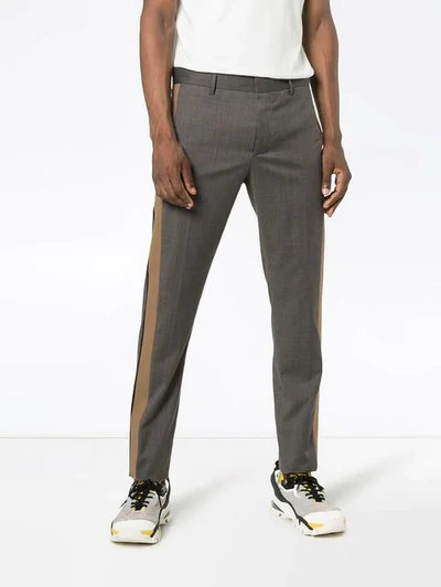 Shop Prada Checked Side Stripe Trousers - Grey