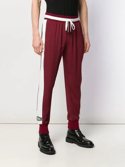 Shop Dolce & Gabbana Crown Patch Track Trousers In Red