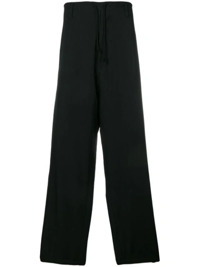 Shop Yohji Yamamoto Wide Tailored Trousers - Black