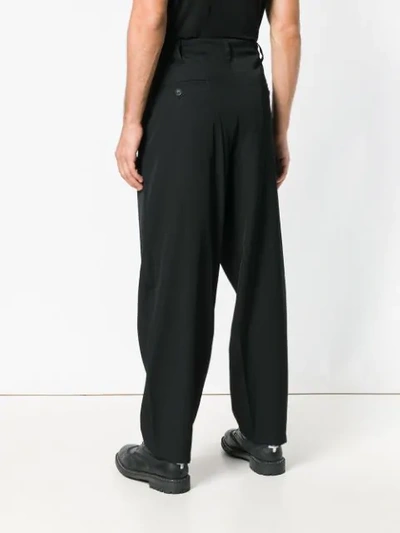 Shop Yohji Yamamoto Wide Tailored Trousers - Black