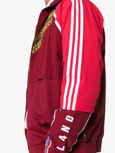 Shop Adidas Originals Adidas X Pharrell Afro Hu Joggingjacke Mit Kontratsstreifen - Rot In Red
