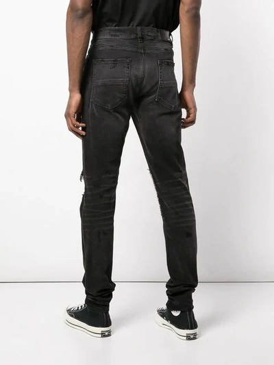 Shop Amiri Stud Detail Jeans In Aged Black