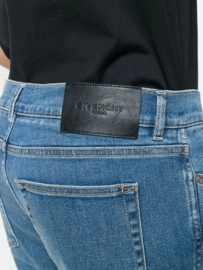 Shop Givenchy Low-rise Side-logo Jeans In Blue