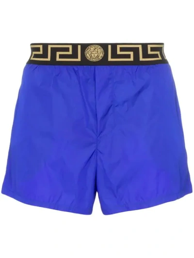 Shop Versace Logo Waist Swim Shorts In Blue