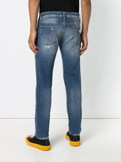 Shop Dolce & Gabbana Distressed Jeans In Blue