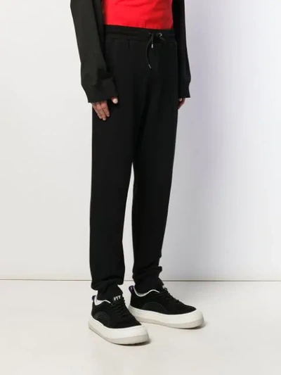 Shop Mcq By Alexander Mcqueen Appliqué Patch Track Pants In Black